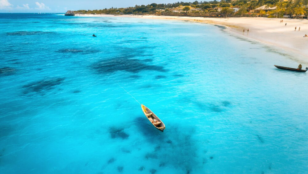 Aerial view of the fishing boats on tropical sea coast