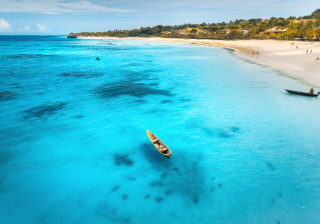 Aerial view of the fishing boats on tropical sea coast