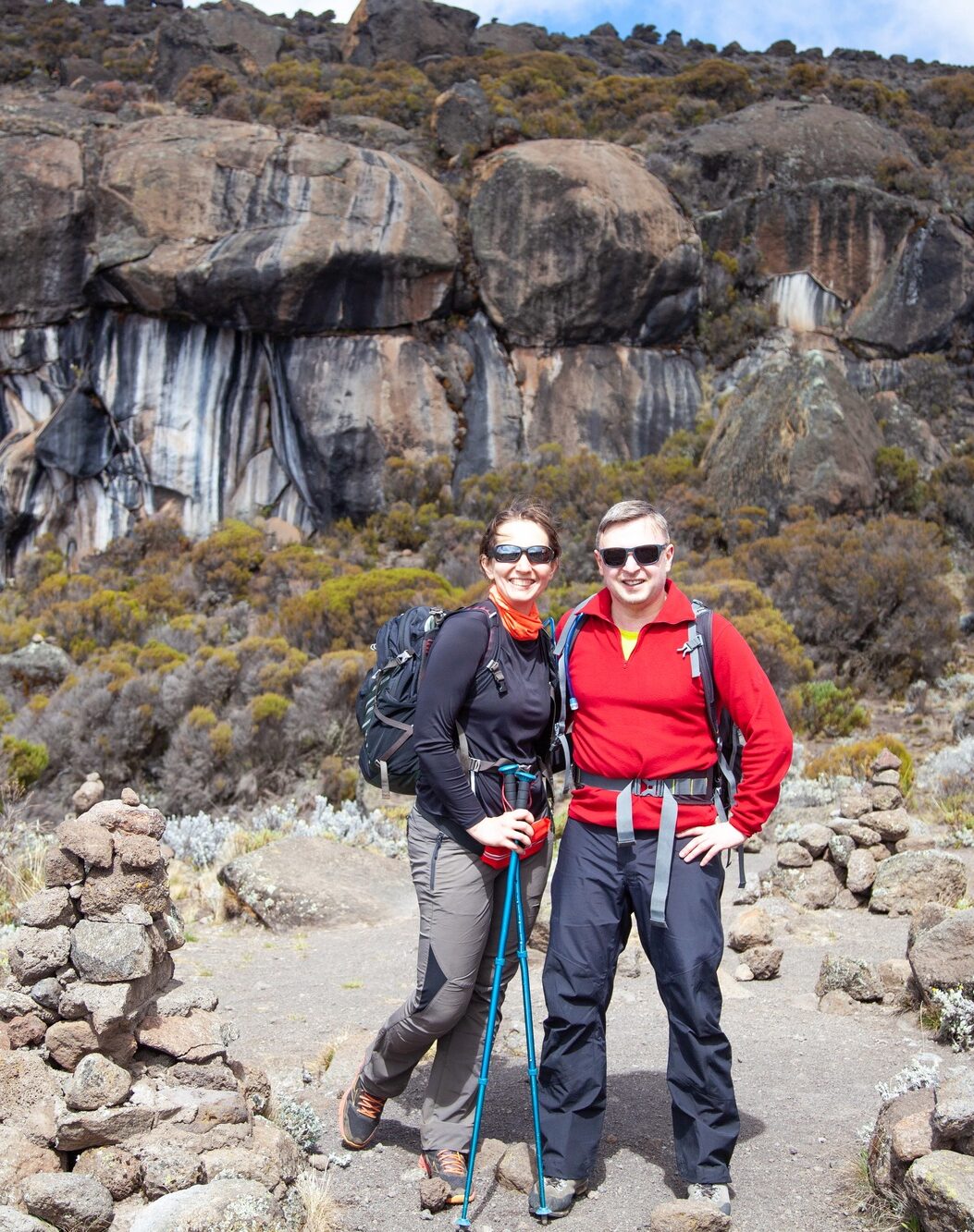 Couple backpackers on the trek to Kilimanjaro mountain