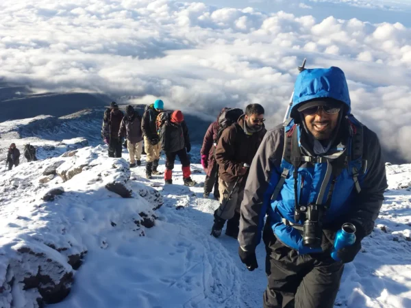 trekkers climbing mt kilimanjaro